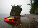 Kayaks by the shore