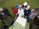 Cliff Speer shows the group the planned route between Batoche and St-Louis. 